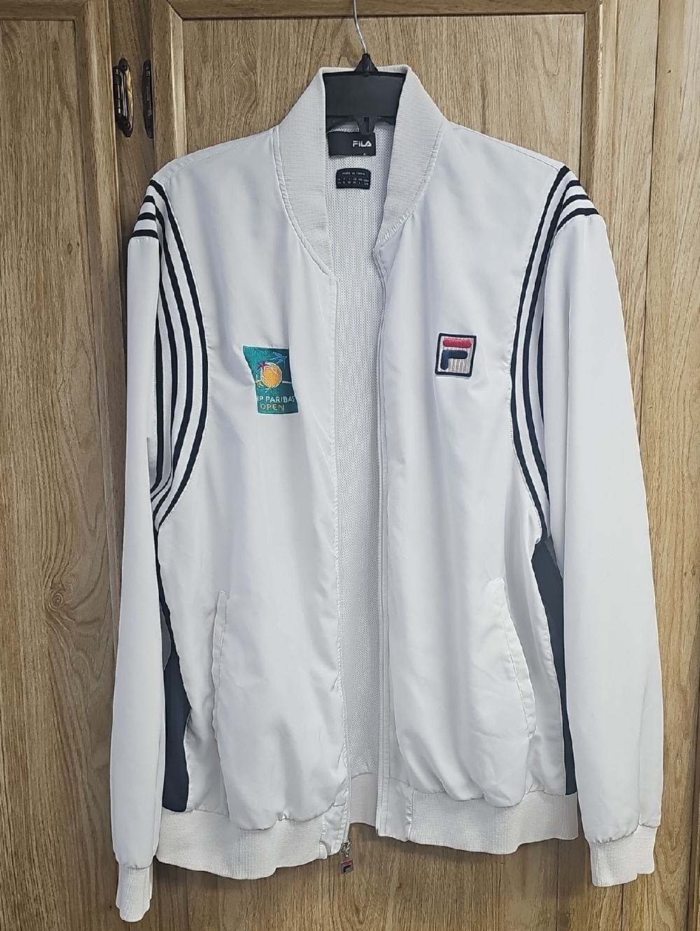 Fila White Jacket with Black Stripe Accents